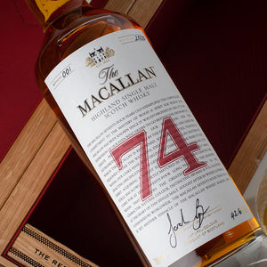 "Botella de Macallan Red Collection 74 Años 700 ml con empaque de madera de lujo, disponible en Cava Sautto."
