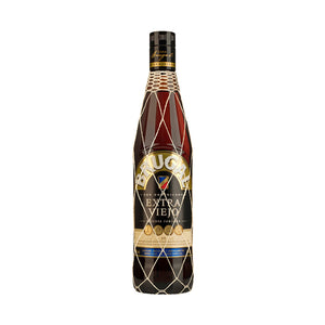 Botella de Ron Brugal Extra Viejo 700 ml – Ron dominicano añejado con notas de caramelo, vainilla y frutos secos.