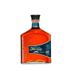 Botella de Ron Flor de Caña Centenario 12 Años 750 ml – Ron premium nicaragüense con notas de vainilla, frutos secos y madera tostada.