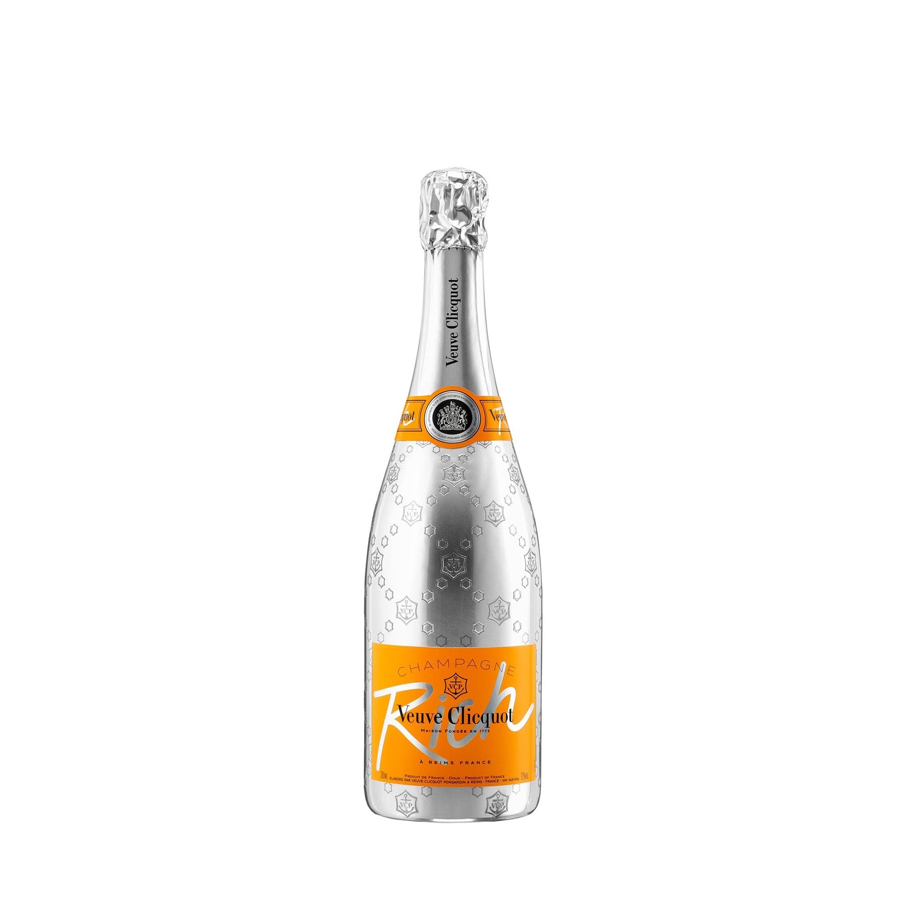 "Botella de Veuve Clicquot Rich 200 ml servida en copa con hielo y cítricos. Champagne ideal para cócteles refrescantes."